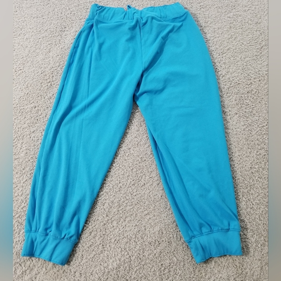 Under Armour AllSeasonGear Blue and Yellow Loose Crop Pants - Picture 2 of 4